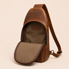 The Crazy Horse Brown Metro sling open, showing the olive lining and the Bellvari leather patch — view 4