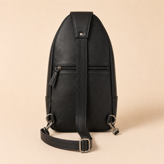 Back of the Black Metro sling with the zipped back pocket, strap buckle and silver-tone swivel hooks — view 9