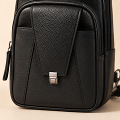 Close-up of the Black Metro's clasp-flap pocket and silver-tone push-lock clasp — view 11