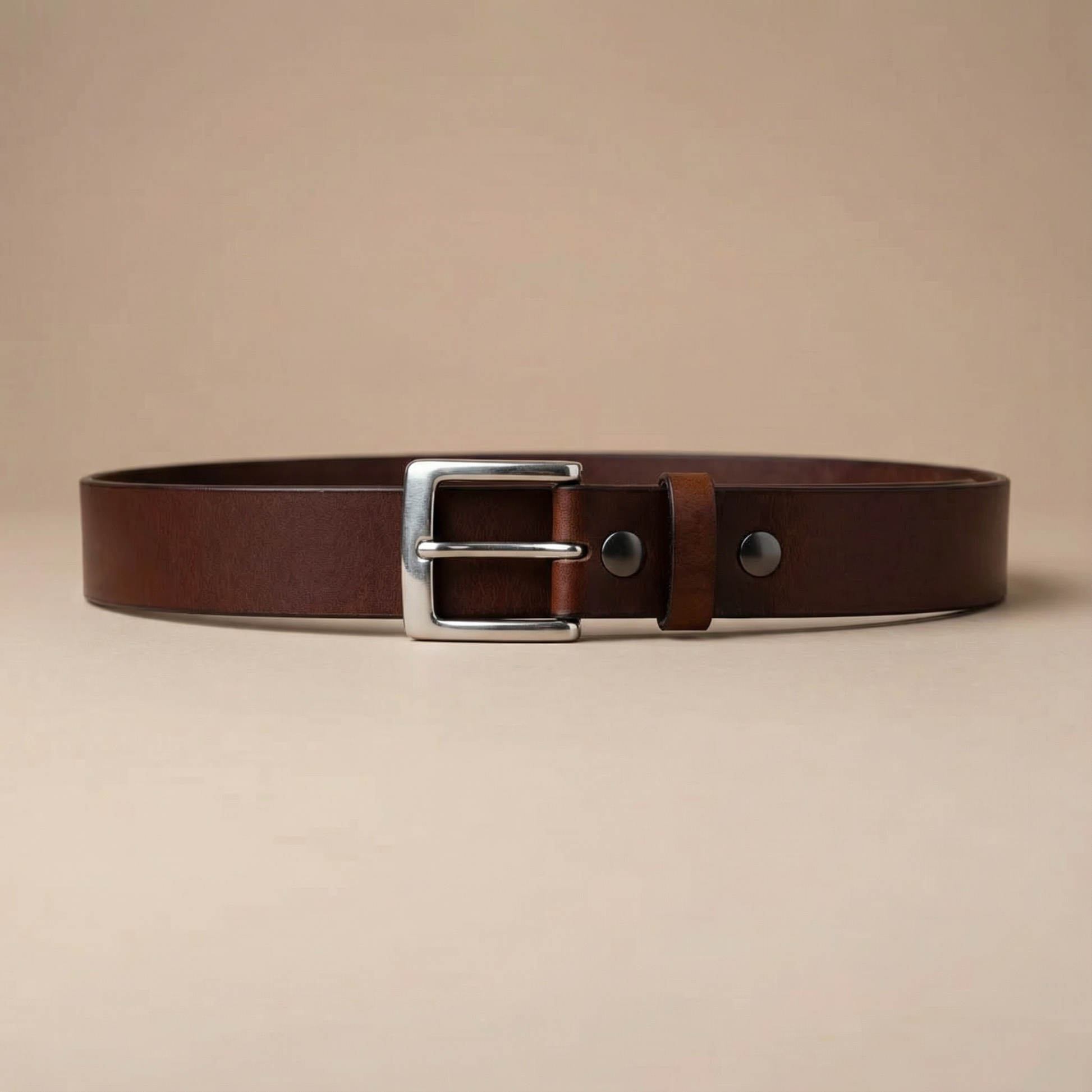Bellvari Trailblazer leather belt with satin-nickel buckle, side view.
