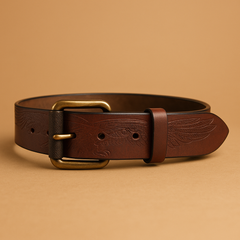 Bellvari Serpent harness-weight full-grain leather belt photographed in natural light, brushed stainless buckle with line snaps. — view 3