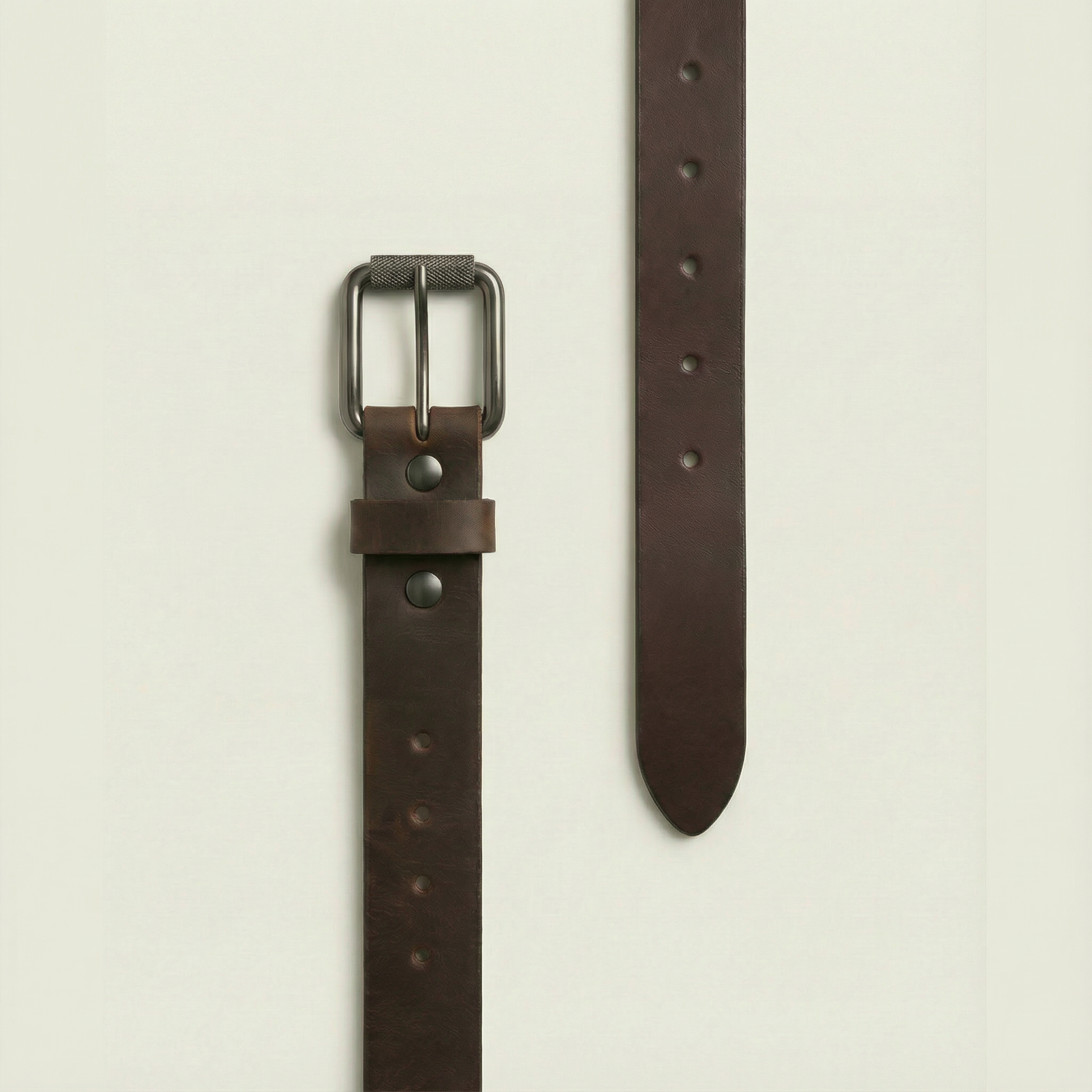 Bellvari Timberline brown leather belt with rugged gunmetal buckle, side view.