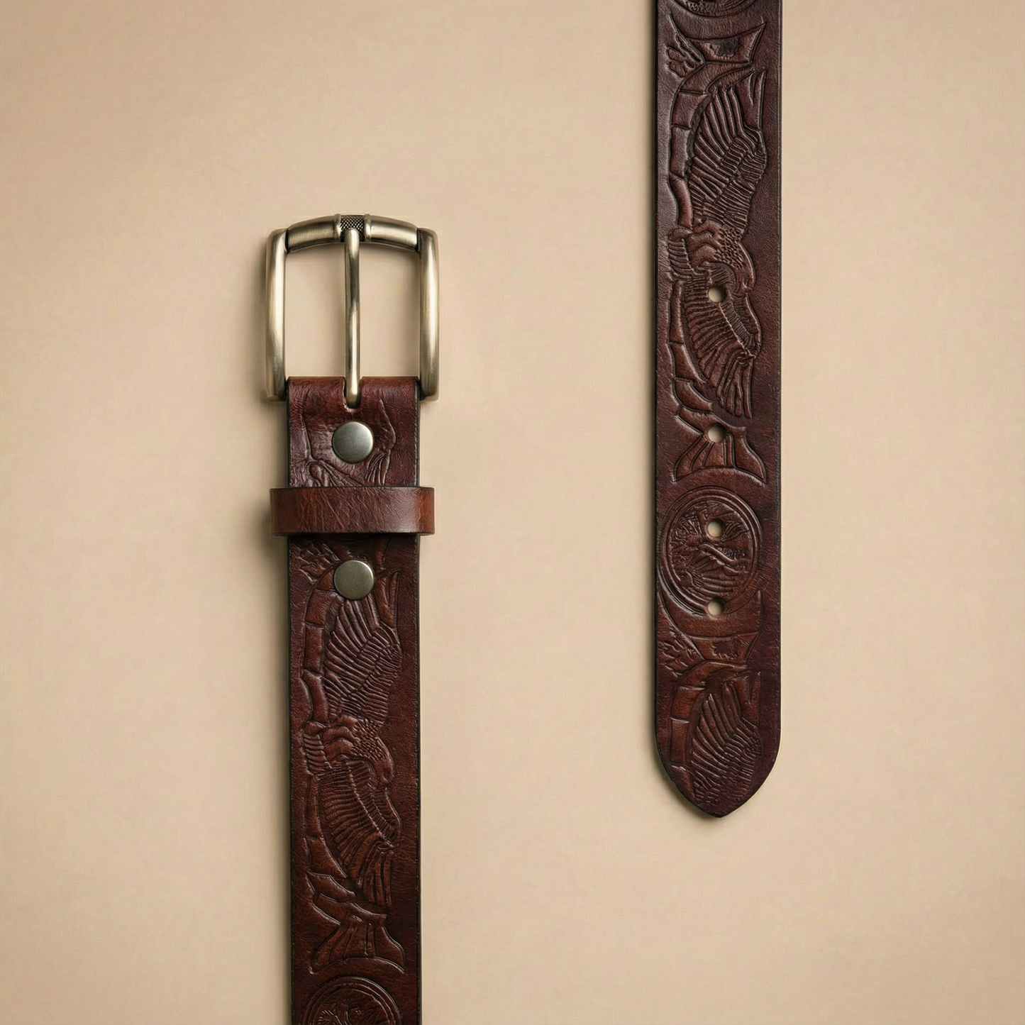 Bellvari Ironhide leather belt detail of hand-tooled floral pattern.
