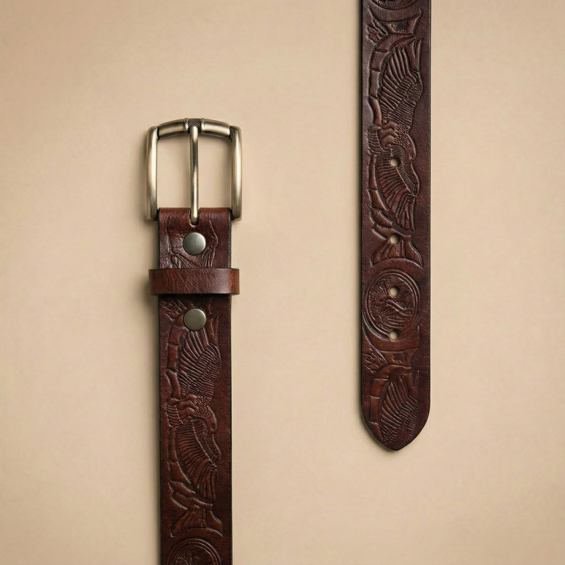 Bellvari Ironhide leather belt detail of hand-tooled floral pattern.