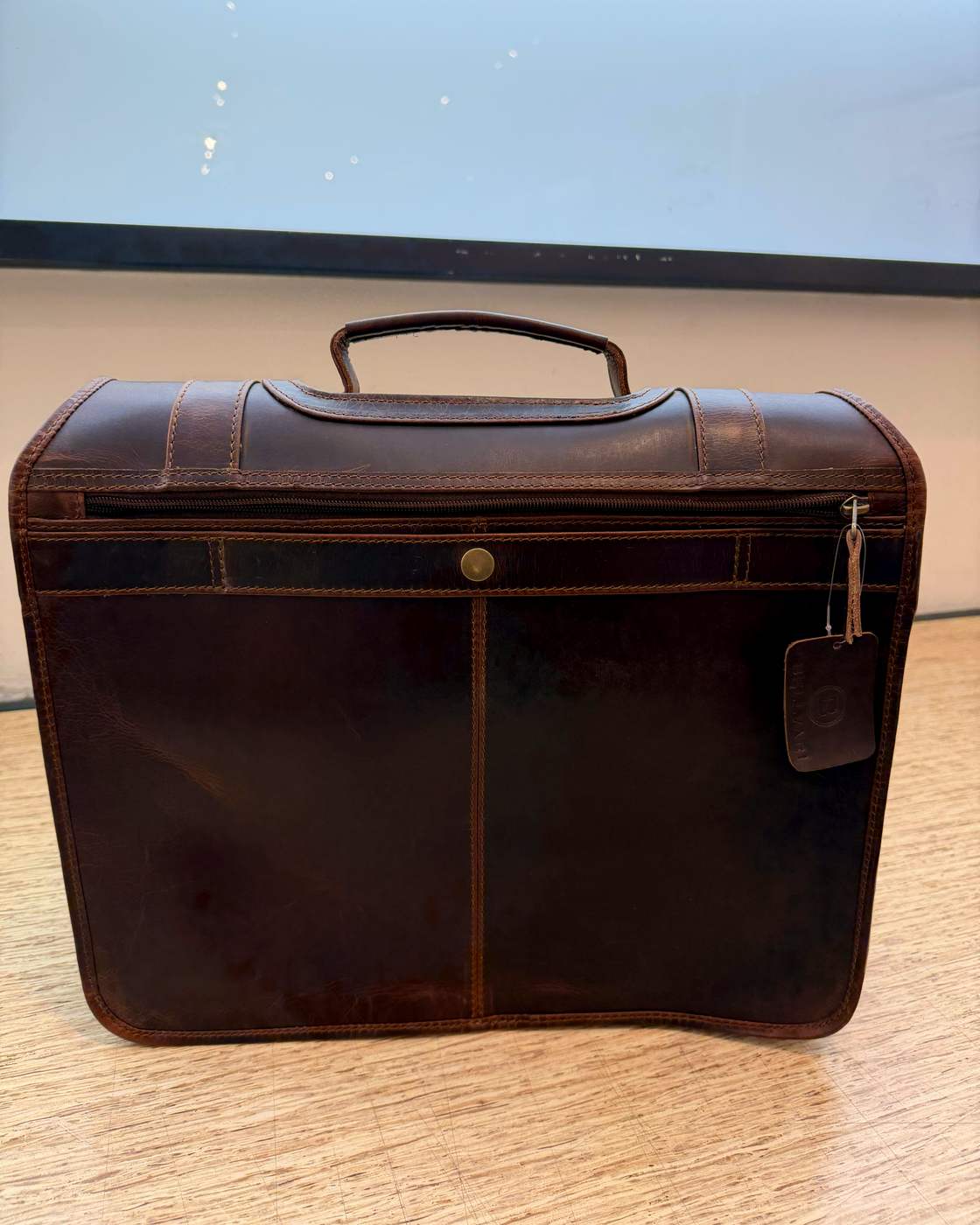 Real photo of The Messenger back with the zip pocket