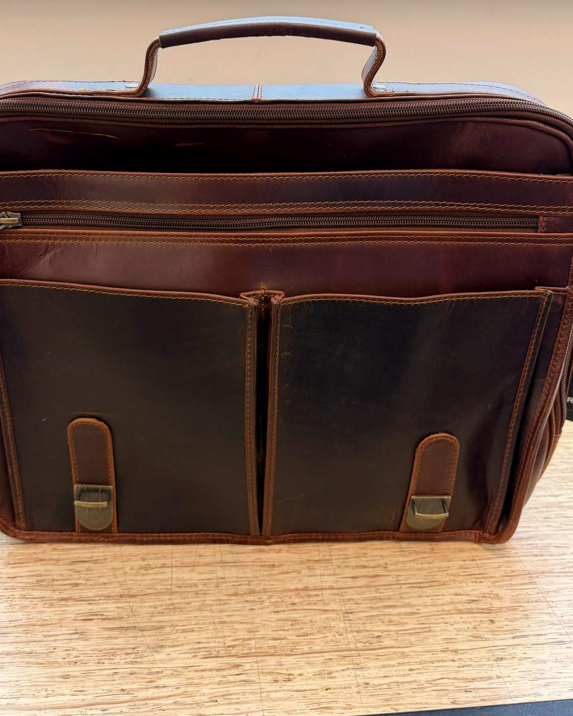 Real photo of The Messenger with the flap lifted, front pockets showing